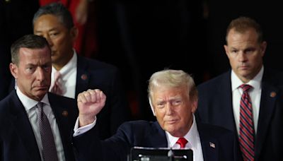 RNC 2024 live: Trump receives hero’s welcome on RNC floor to ‘Back in Black’ still sporting ear bandage