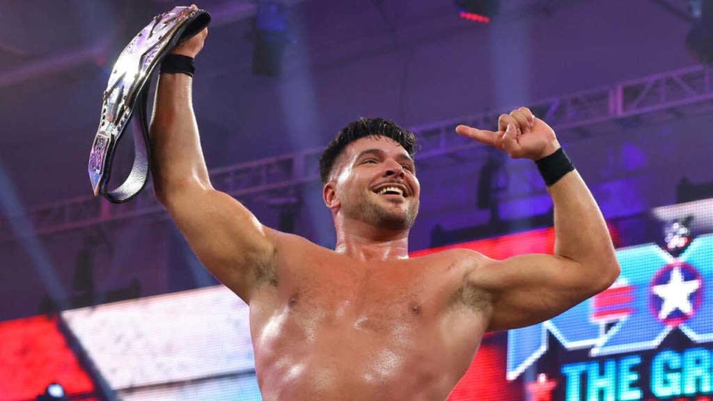 Ethan Page Responds To ‘I Quit My Job To Be Here’ Sign At WWE Raw: Me Too