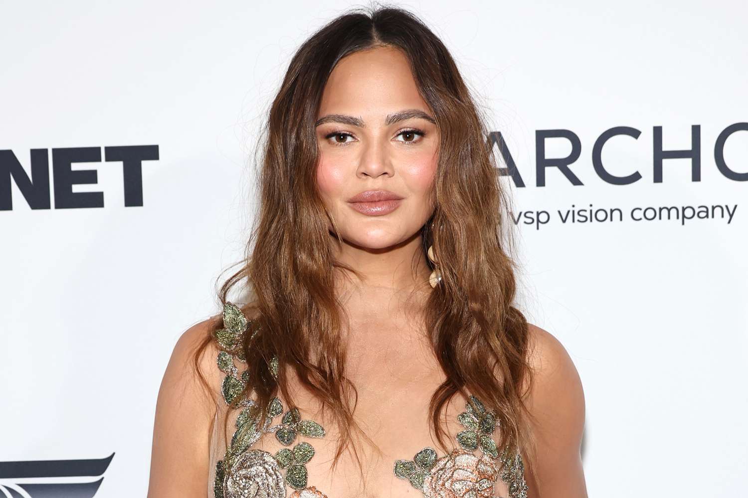 Chrissy Teigen Wows in Her Own Naked Floral Dress 1 Day After the Met Gala