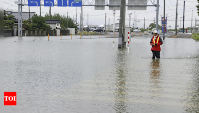 Three missing, 4,000 evacuated as heavy rains in Japan trigger floods, landslides - Times of India