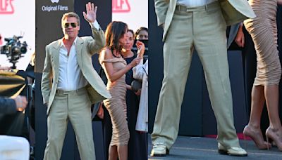 Brad Pitt and Ines de Ramon Dress Up for ‘Wolfs’ Premiere in Loafers and Peep-Toe Louboutin Pumps