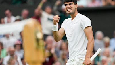 Defending Wimbledon champion Carlos Alcaraz comes back to beat Frances Tiafoe in the third round