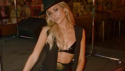 Kristin Cavallari models a black bra and hot pants