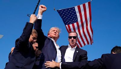 Bloodied, defiant Trump with raised fist: An enduring image that likely will fuel his campaign