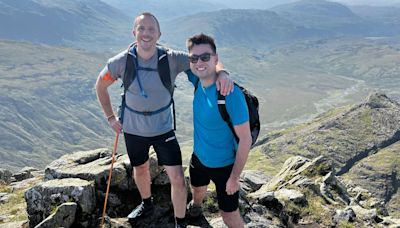 Blind lawyer and boss climb 24 peaks in 24 hours