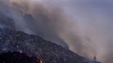 A trash mountain in India the size of 12 football fields caught fire. The toxic fumes from the burning heap are making firefighters faint.