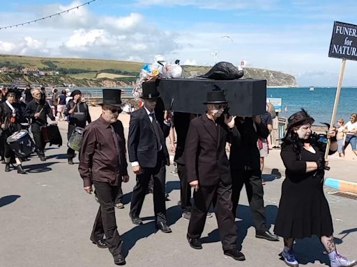 Dorset eco groups stage 'funeral for nature'