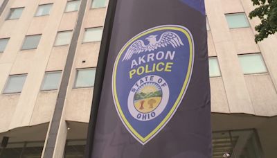 Akron police: Suspect charged with murder after man was shot, crashed into pole