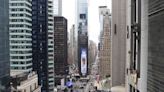 Water main built in 1896 bursts in Times Square disrupting subway service