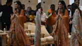 Isha Ambani embodies pre-wedding spirit in this stunning orange suit adorned with intricate golden details