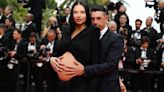 Model Adriana Lima walked a red carpet in a daring maternity dress that had a cutout for her baby bump