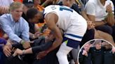 Timberwolves coach Chris Finch carried off court after sideline collision — serious knee injury feared