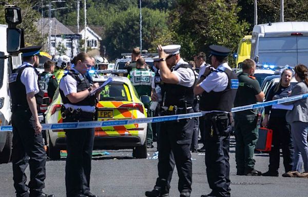 Bloodied children flee a stabbing attack in England. 8 people are hurt and a man is arrested