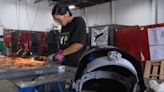 Latinas Welding Guild nearing completion of 14,000-pound Eiffel Tower ahead of U.S. Olympic Swim Trials