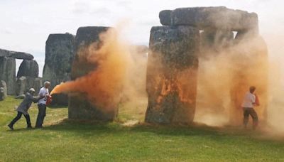 Climate activists spray Stonehenge with orange powder, demanding end to fossil fuels in UK