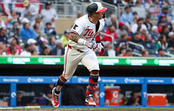 Miranda's 5 hits lead Twins to rain-shortened 12-3 win over Tigers