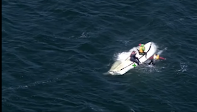 Two cling to boat after it capsizes in the middle of a bay, California deputies say