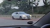 Moment car comes hurtling towards oncoming traffic on the M4