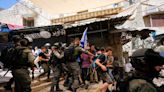 Israeli nationalists march through Palestinian area of Jerusalem, some chanting ‘Death to Arabs’