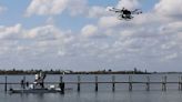 Conservation group uses drone to drop millions of clams into Indian River Lagoon