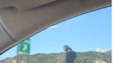 Electric unicycle rider seen cruising down Interstate 15 in the Cajon Pass