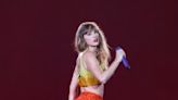 Taylor Shows Wears Chiefs Colors at Paris Concert With Travis Kelce Watching