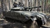 Russia presses its offensive in Ukraine and issues new threats as the West tries to blunt the push