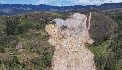 Search underway for dozens buried in Indonesian landslide that killed 23