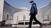 Chinese money flows into bonds even as central bank warns of risks