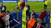 Cristiano Ronaldo narrowly avoids being two-footed by fan jumping from stands