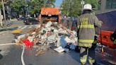 WATCH: Crews soak garbage pile in DC to put out garbage truck fire