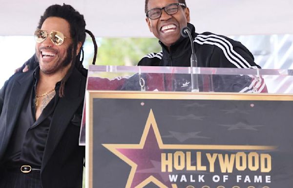 Lenny Kravitz answers video call from 'big brother' Denzel Washington onstage in Italy