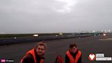 Climate protesters occupy Berlin airport runway and ‘glue themselves to asphalt’