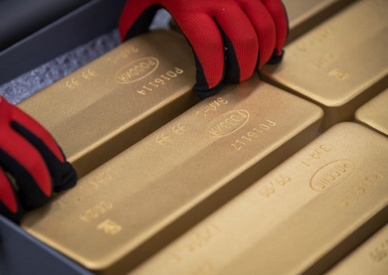 Gold skids on profit-taking, with US economic data on radar