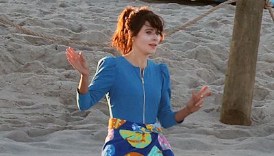 Zooey Deschanel rocks a bathing suit with Charlie Cox while filming Merv