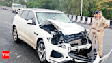 Tragedy averted as structure falls on moving car | Mumbai News - Times of India