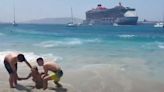 Fury on beautiful Greek island as giant wave from cruise ship injures swimmers