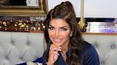 Teresa Giudice Flexes Her Stunning Travel Style in a Shiny Gold Jacket & Cozy White Pants