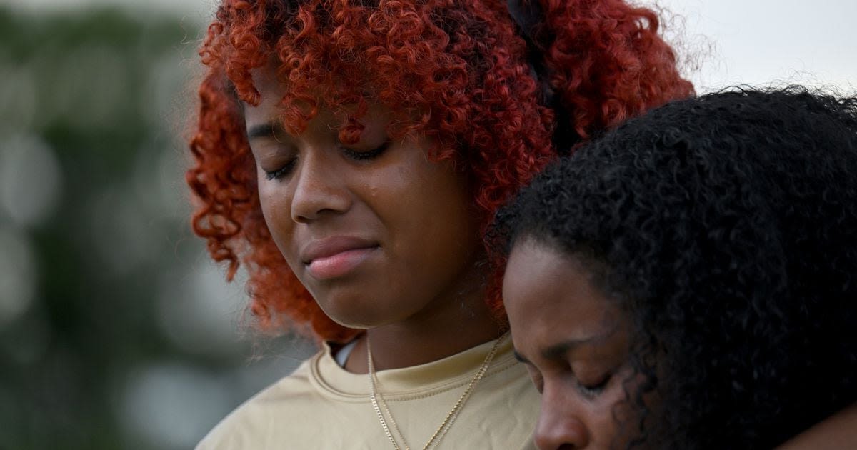 PHOTOS: Vigil for Georgia school shooting victims