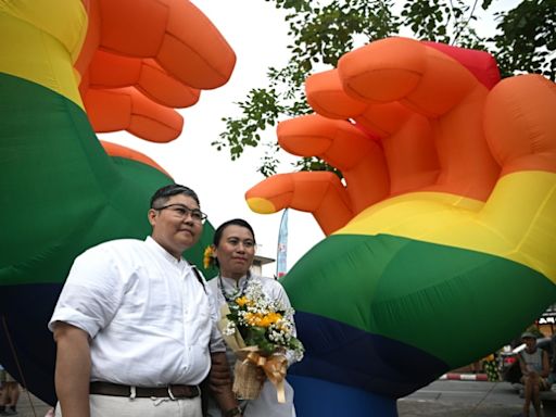 'Our revolution': Myanmar LGBTQ couple tie knot at Thai Pride