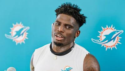 Dolphins give Tyreek Hill a lot more guaranteed money in restructured deal. What to know