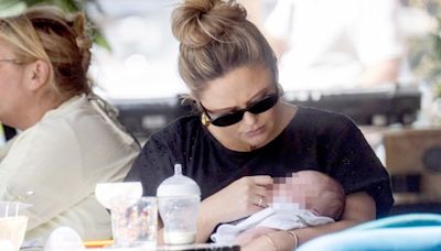 Emily Atack dotes on newborn son in first sighting since giving birth