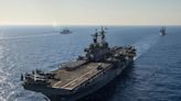 Photos show the USS Eisenhower carrier strike group's 9-month deployment leading the ferocious Houthi fight