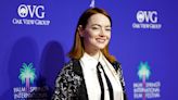 Emma Stone’s Glamorous Suit Look Includes a Silky Robe Covered in Crystals