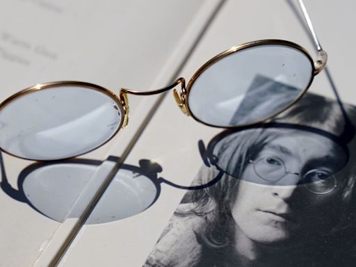 Blue-tinted glasses given by John Lennon to be auctioned with Abbey Road photos