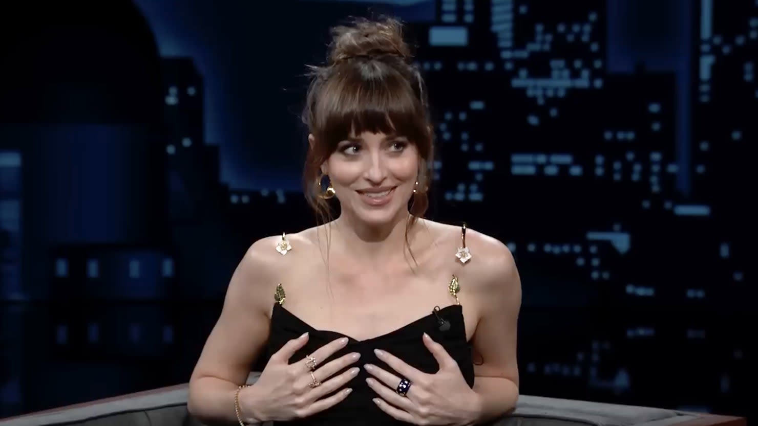 Dakota Johnson Tells ‘D*ck Pic’ Story While Trying To Hold Her Dress Up