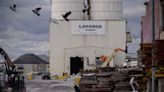 French cement company pleads guilty in U.S. to making payments to ISIS