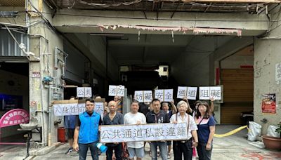 員林綜合市場通道遭圍鐵皮禁行 攤商、居民抗議 (圖)