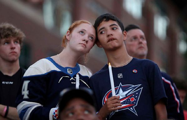 Blue Jackets fans, players remember Johnny and Matthew Gaudreau at a candlelight vigil in Columbus