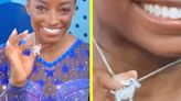 Simone Biles lets world know who greatest is by showing off silver GOAT necklace